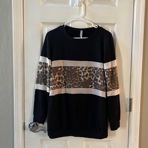 Women’s long sleeve black cheetah shirt size Medium